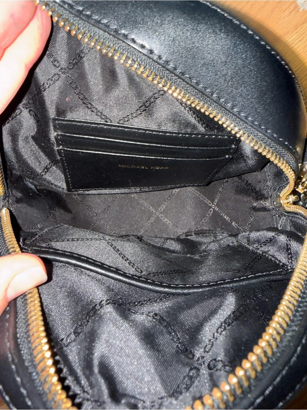 Michael Kors Black Round Crossbody Bag with Gold Stud Accents